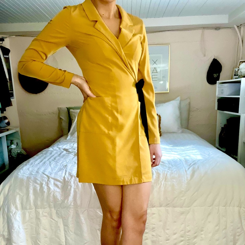 Adorable wrap tie mini dress in mustard yellow. Dynamite size XS